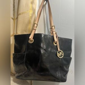 Michael Kors tote. Good used condition, still a good solid purse!